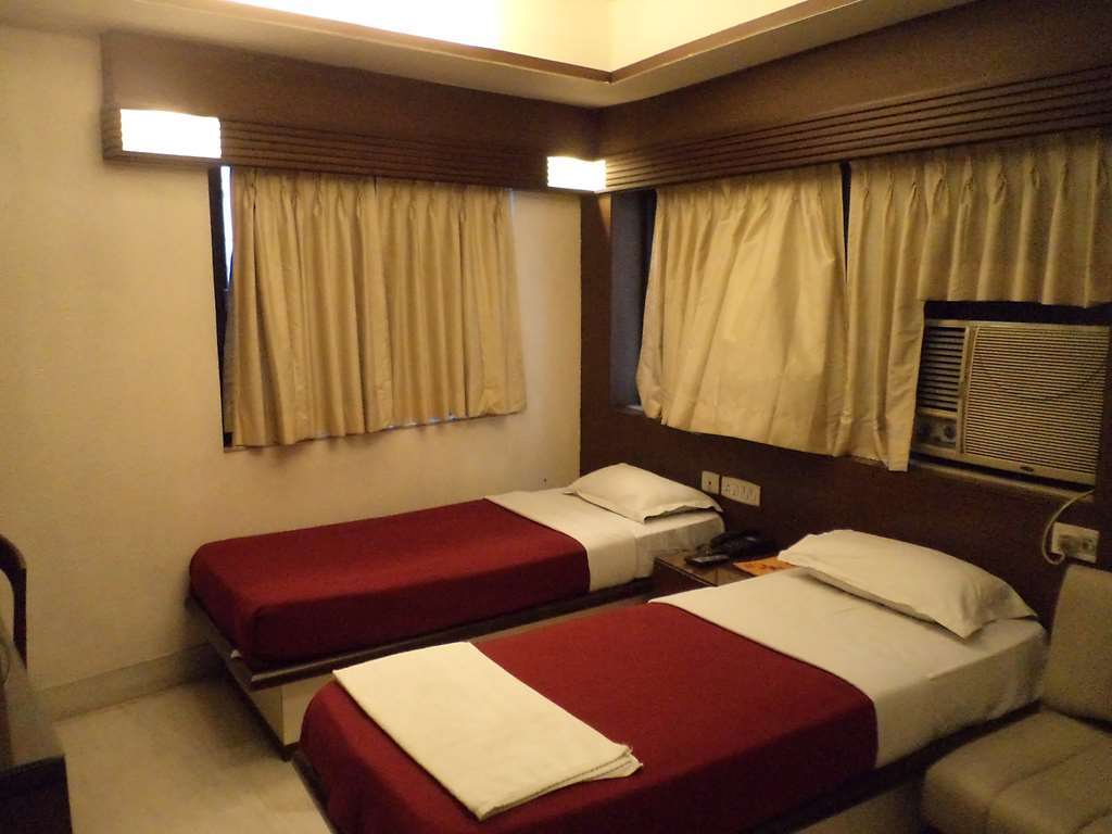 Hotel Aston كولكاتا الغرفة الصورة